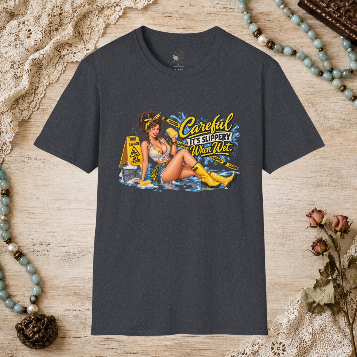 Dark heather grey unisex T-shirt featuring the Careful It’s Slippery When Wet pin-up design