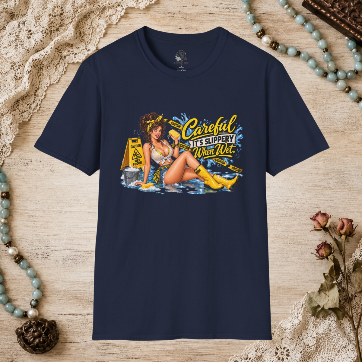 Navy unisex T-shirt featuring the Careful It’s Slippery When Wet pin-up design
