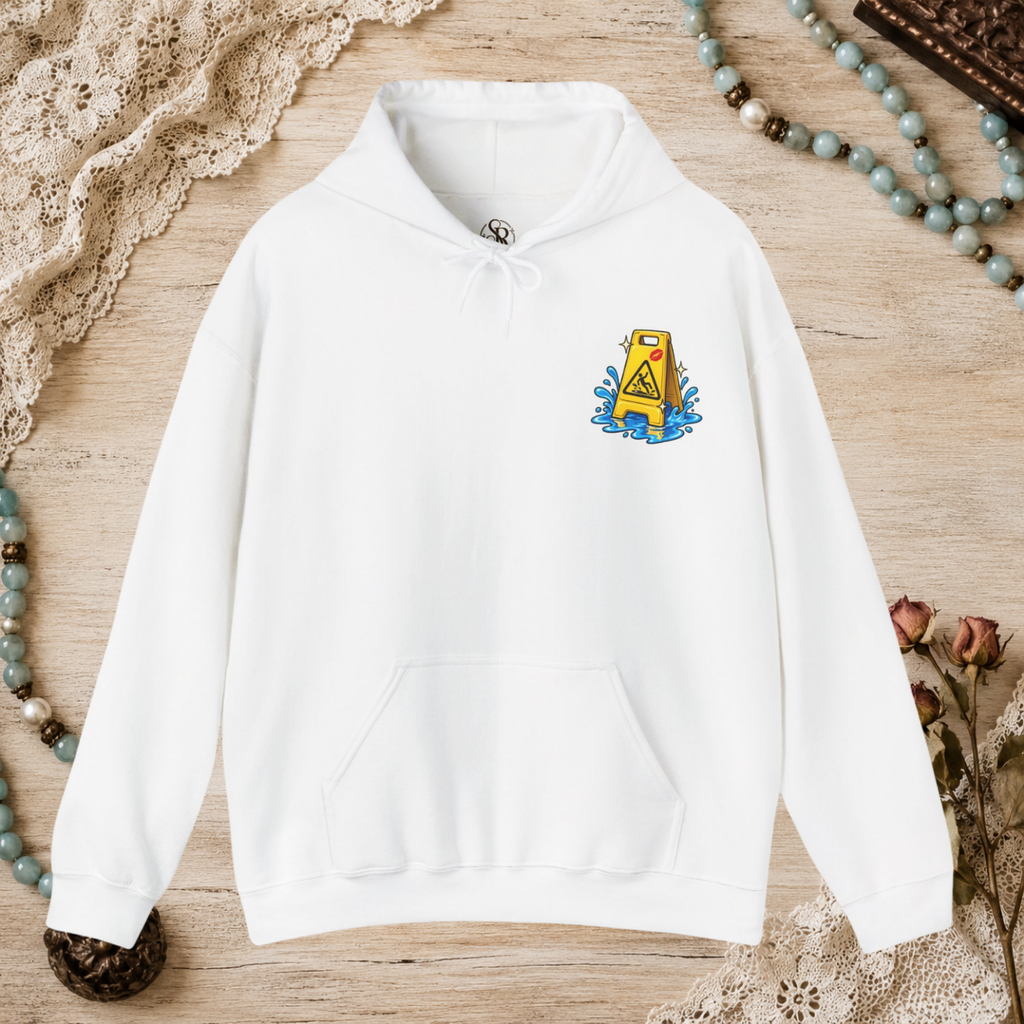 Front of a white unisex hoodie with a small yellow wet-floor caution graphic on the left chest