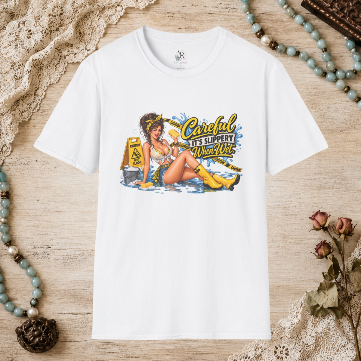 White unisex T-shirt featuring the Careful It’s Slippery When Wet pin-up design