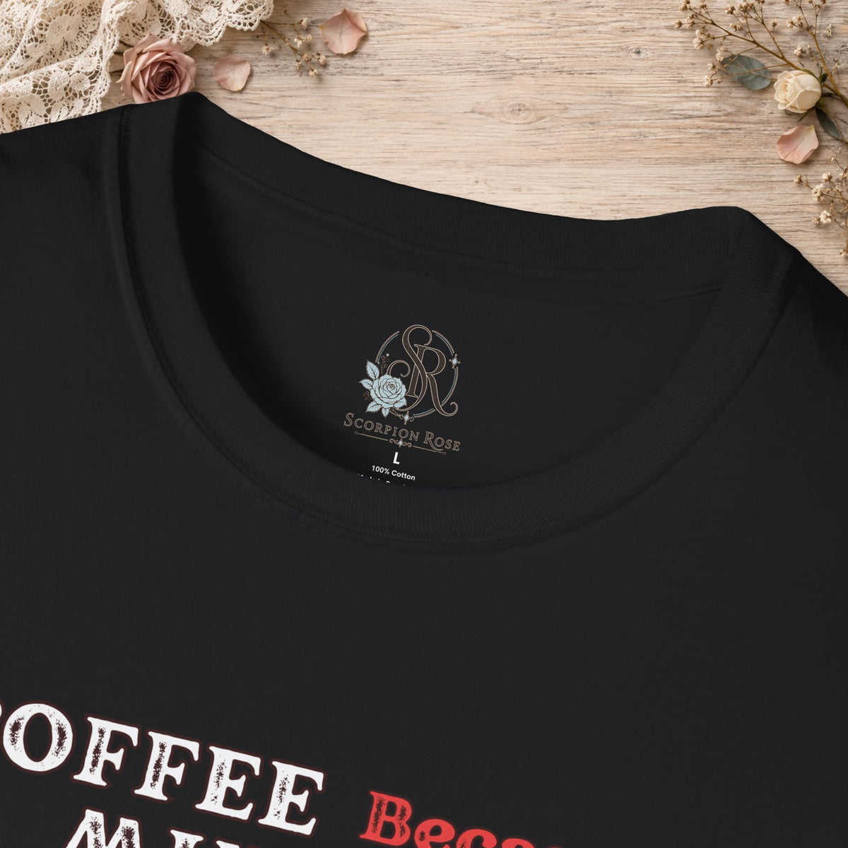 Close-up of the Black Coffee Because Murder Is Wrong T-shirt neckline and printed artwork