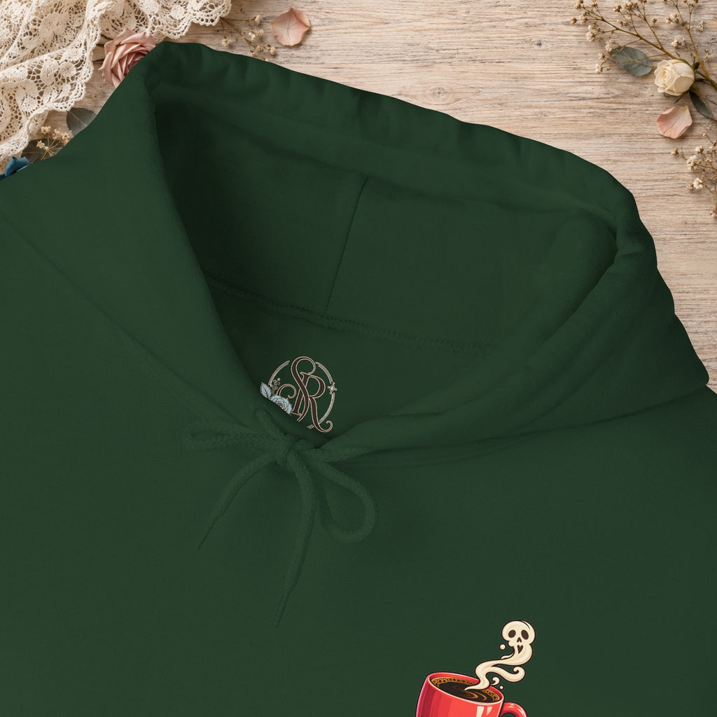Close-up of the Forest Green hoodie neckline and small red coffee cup front design