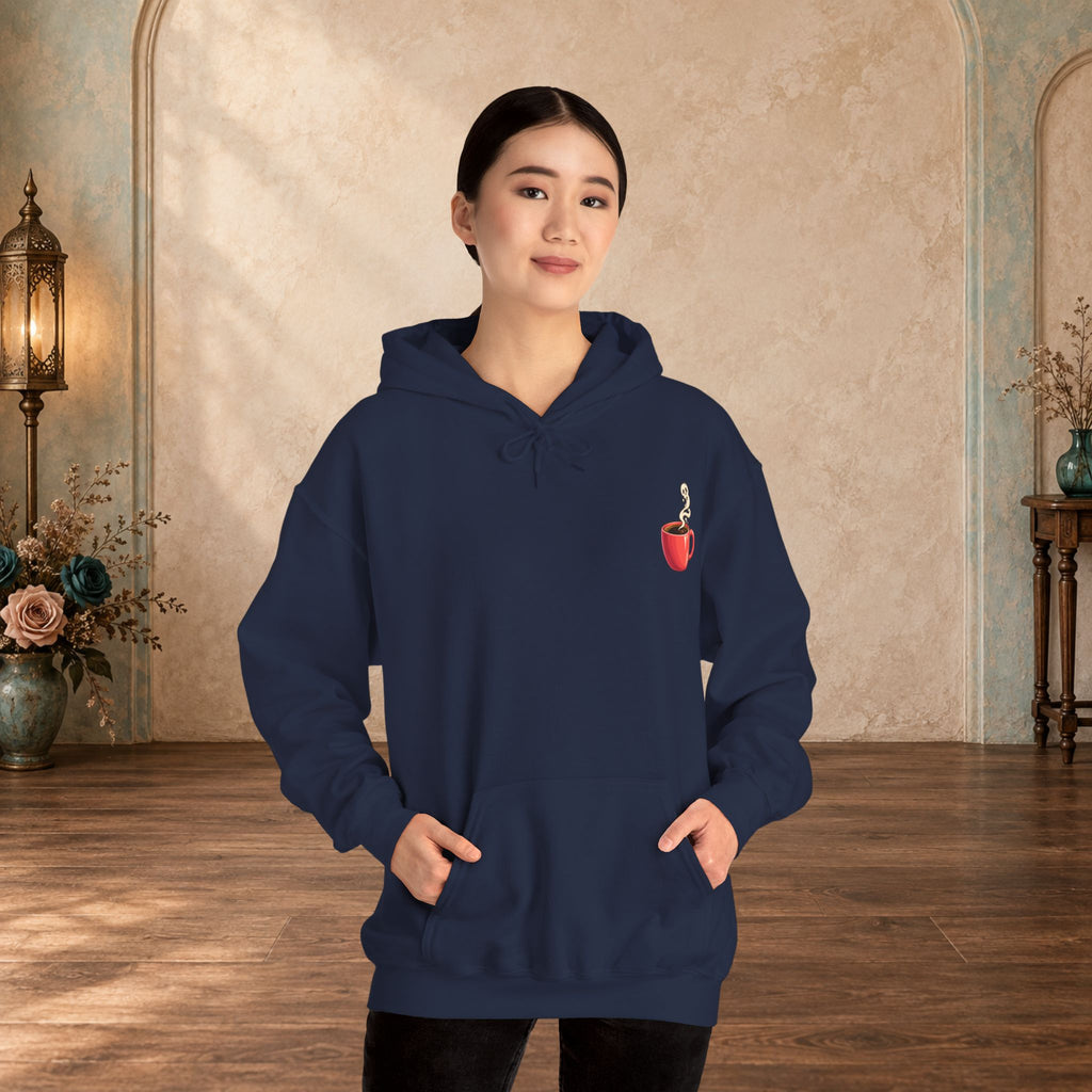 Female model wearing a navy hoodie with a small red coffee cup and heart-steam design on the front