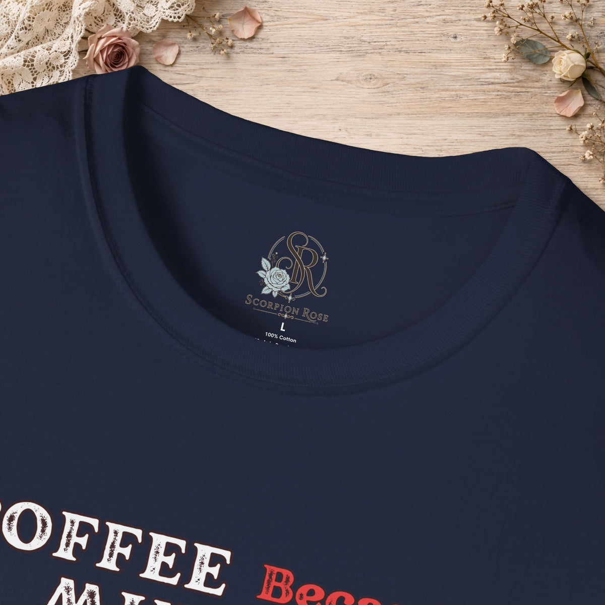 Close-up of the Navy Coffee Because Murder Is Wrong T-shirt neckline and printed design