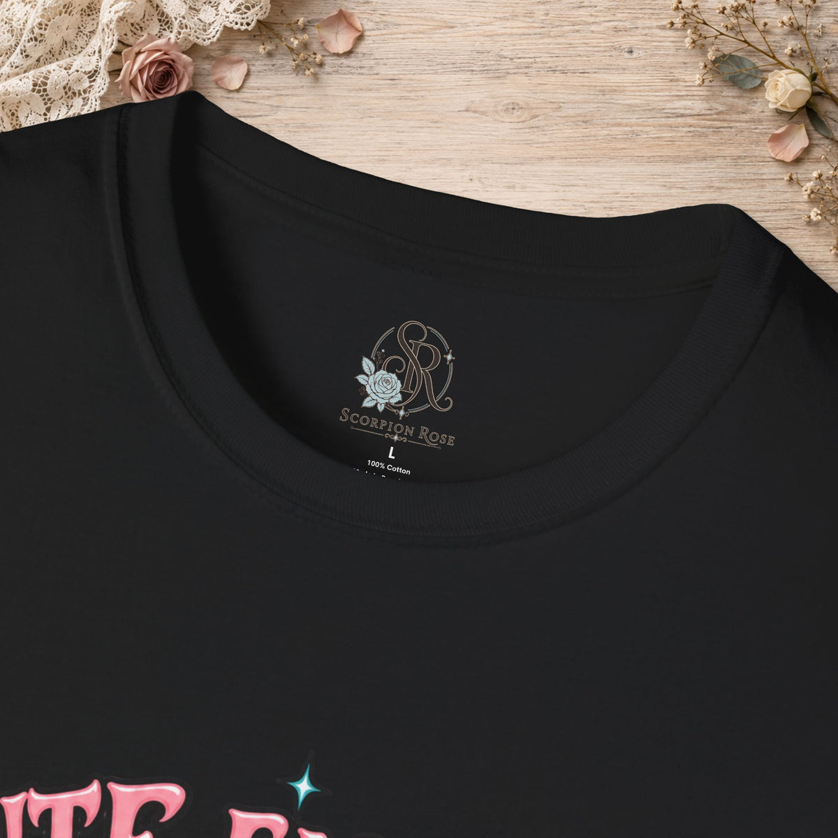 Collar and print detail of the Black Cute Enough to Get Away With It unisex T-shirt