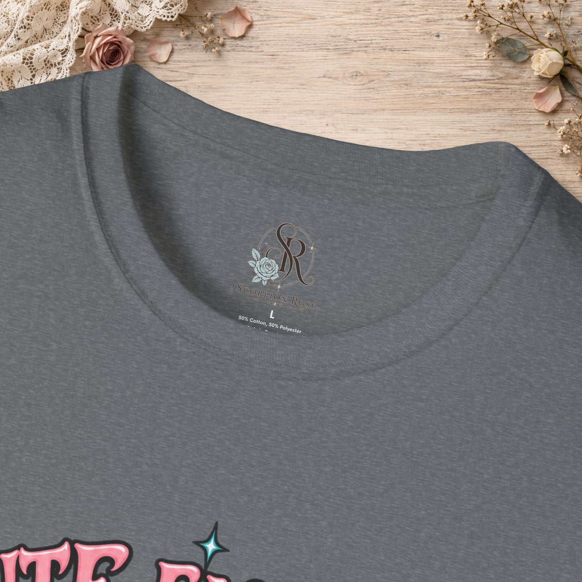 Collar and print detail of the Graphite Heather Cute Enough to Get Away With It unisex T-shirt