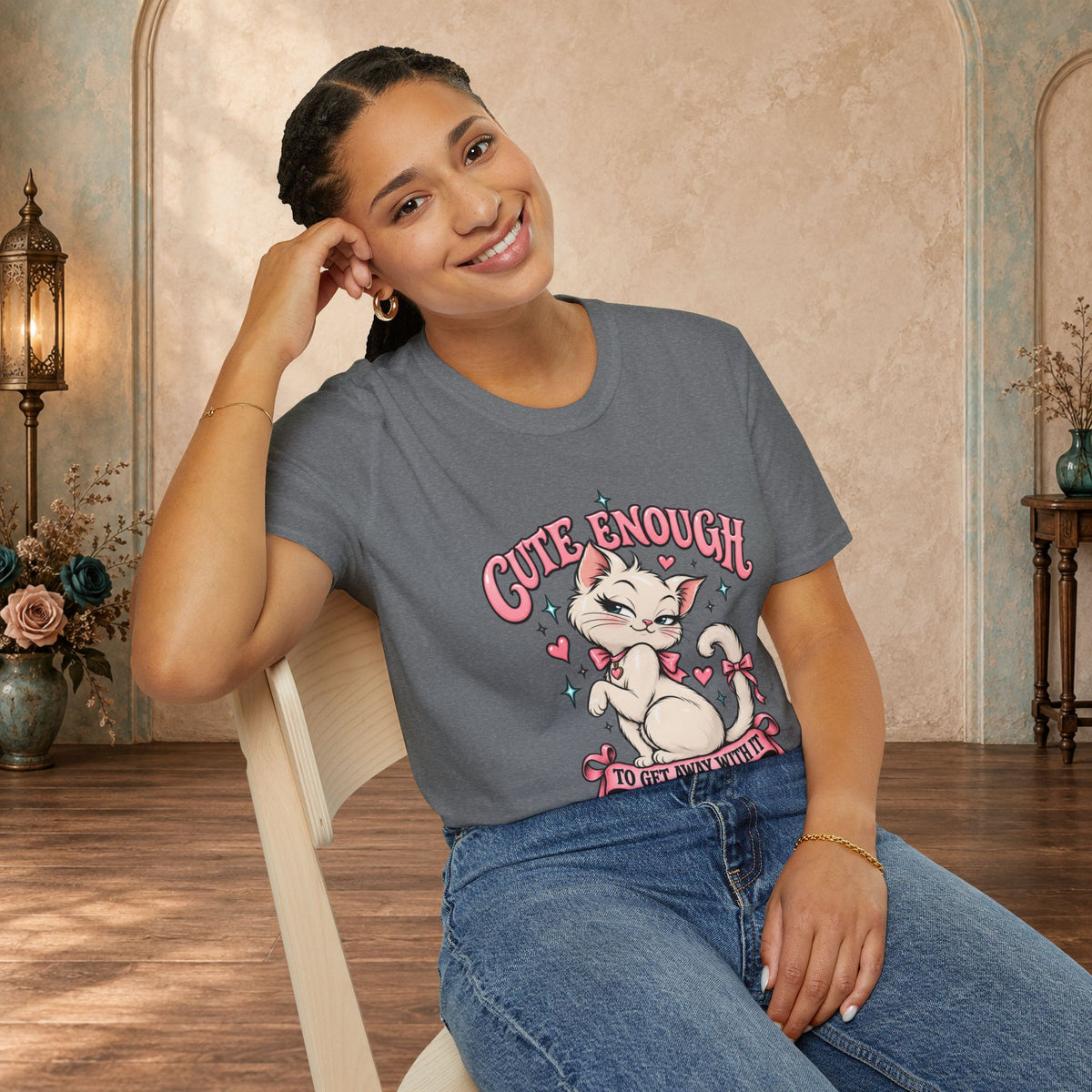 Woman modeling a Graphite Heather Cute Enough to Get Away With It unisex graphic T-shirt