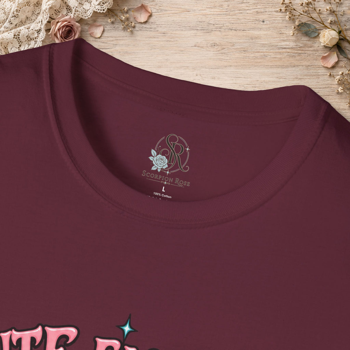 Collar and print detail of the Maroon Cute Enough to Get Away With It unisex T-shirt