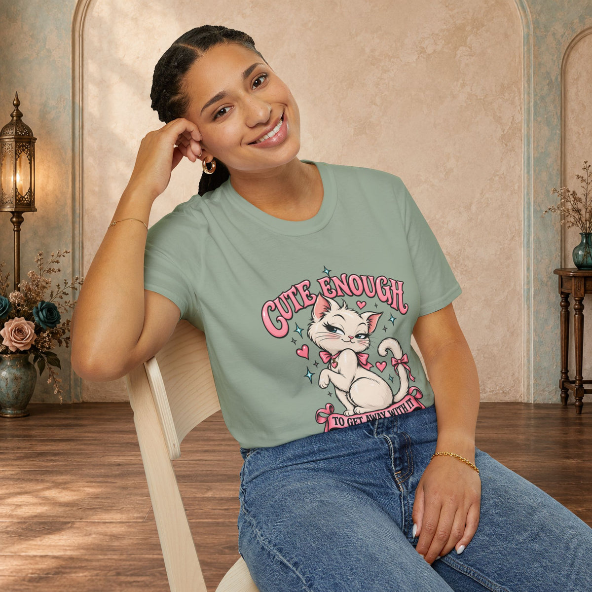 Woman modeling a Sage Cute Enough to Get Away With It unisex graphic T-shirt