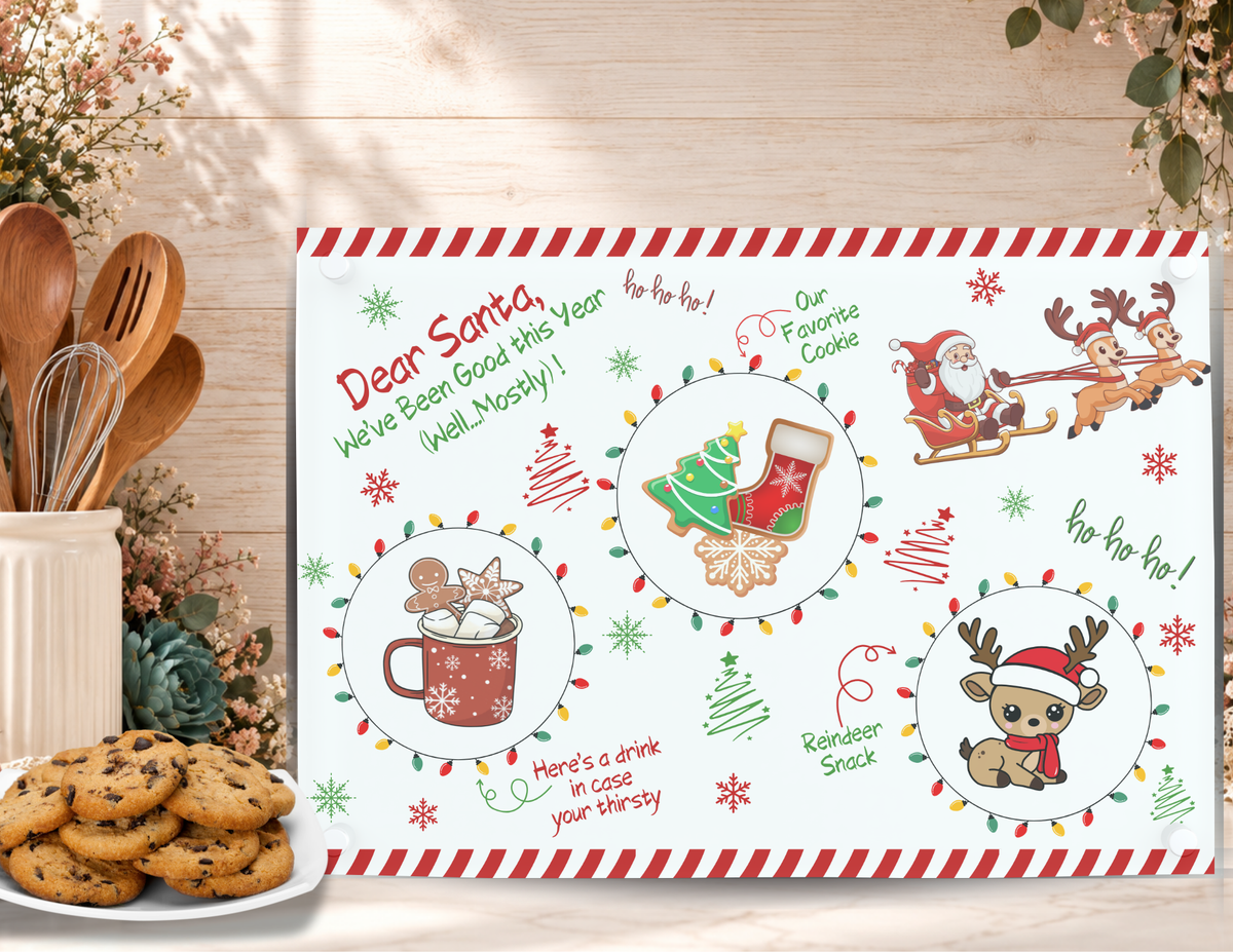 Dear Santa Mostly Good Christmas cookie tray displayed beside a plate of chocolate chip cookies in a festive kitchen