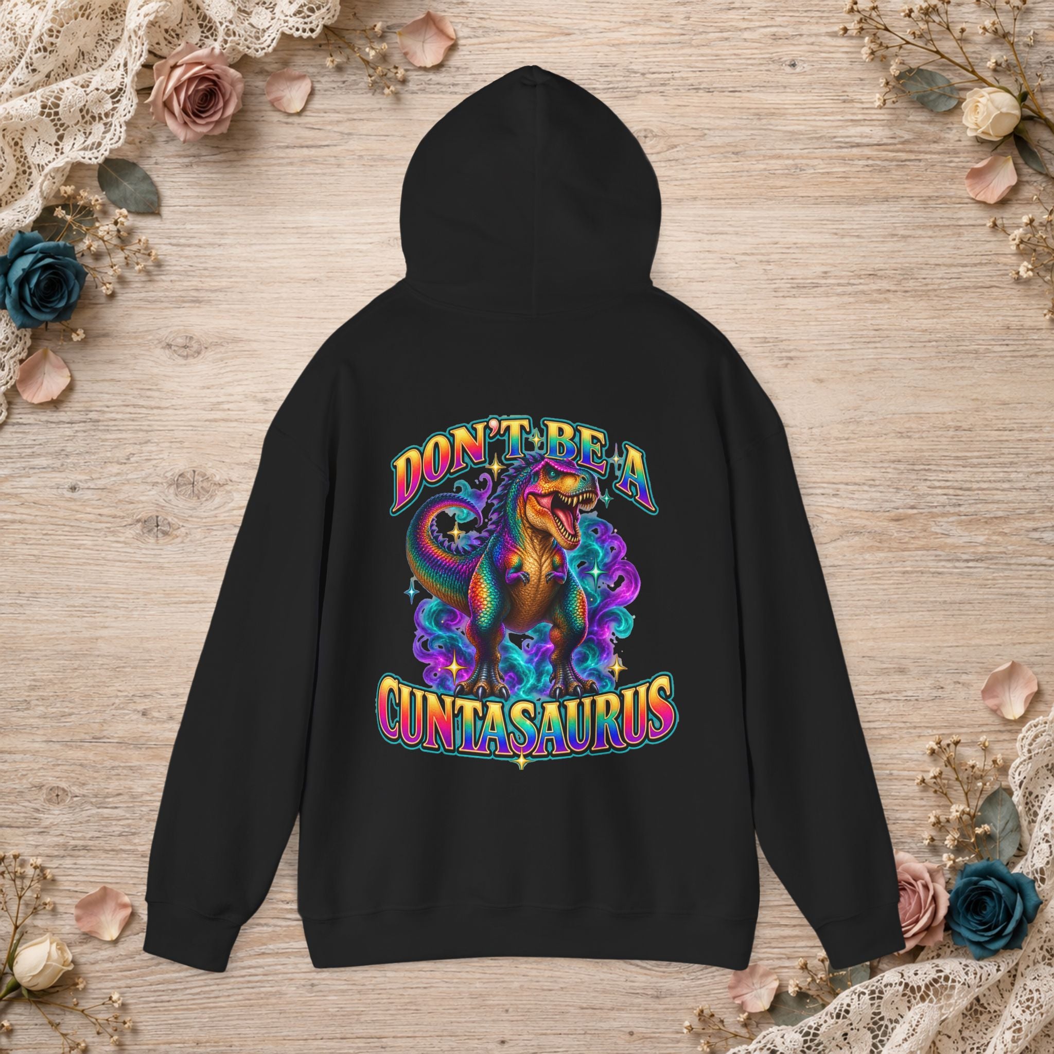 Black Don’t Be a Cuntasaurus adult-humor hoodie with a colorful dinosaur back print