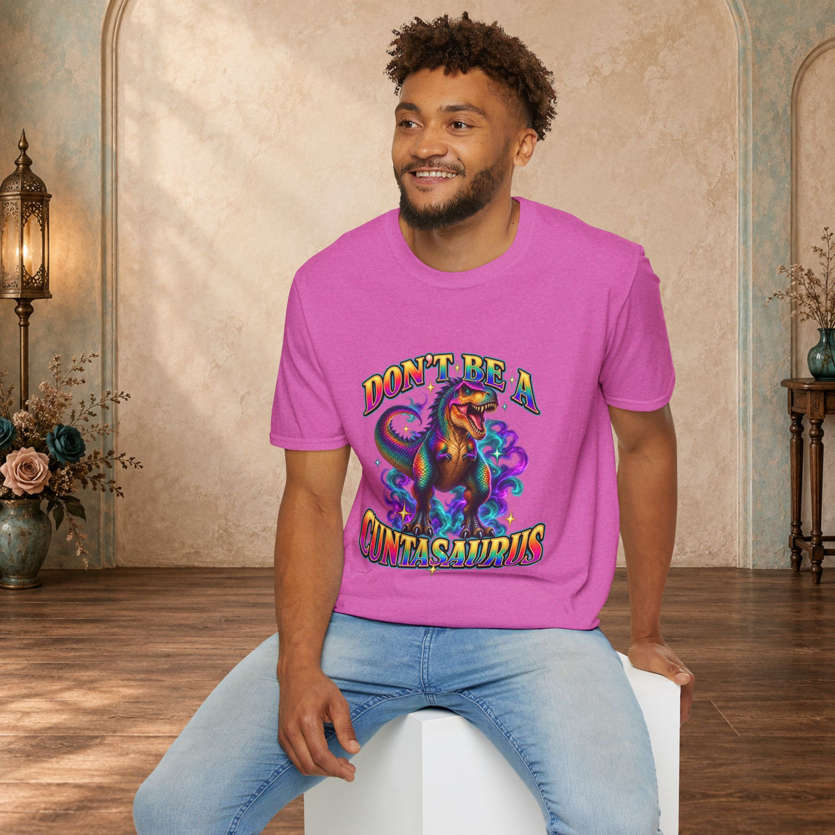Man wearing a heather berry Don’t Be a Cuntasaurus funny dinosaur T-shirt