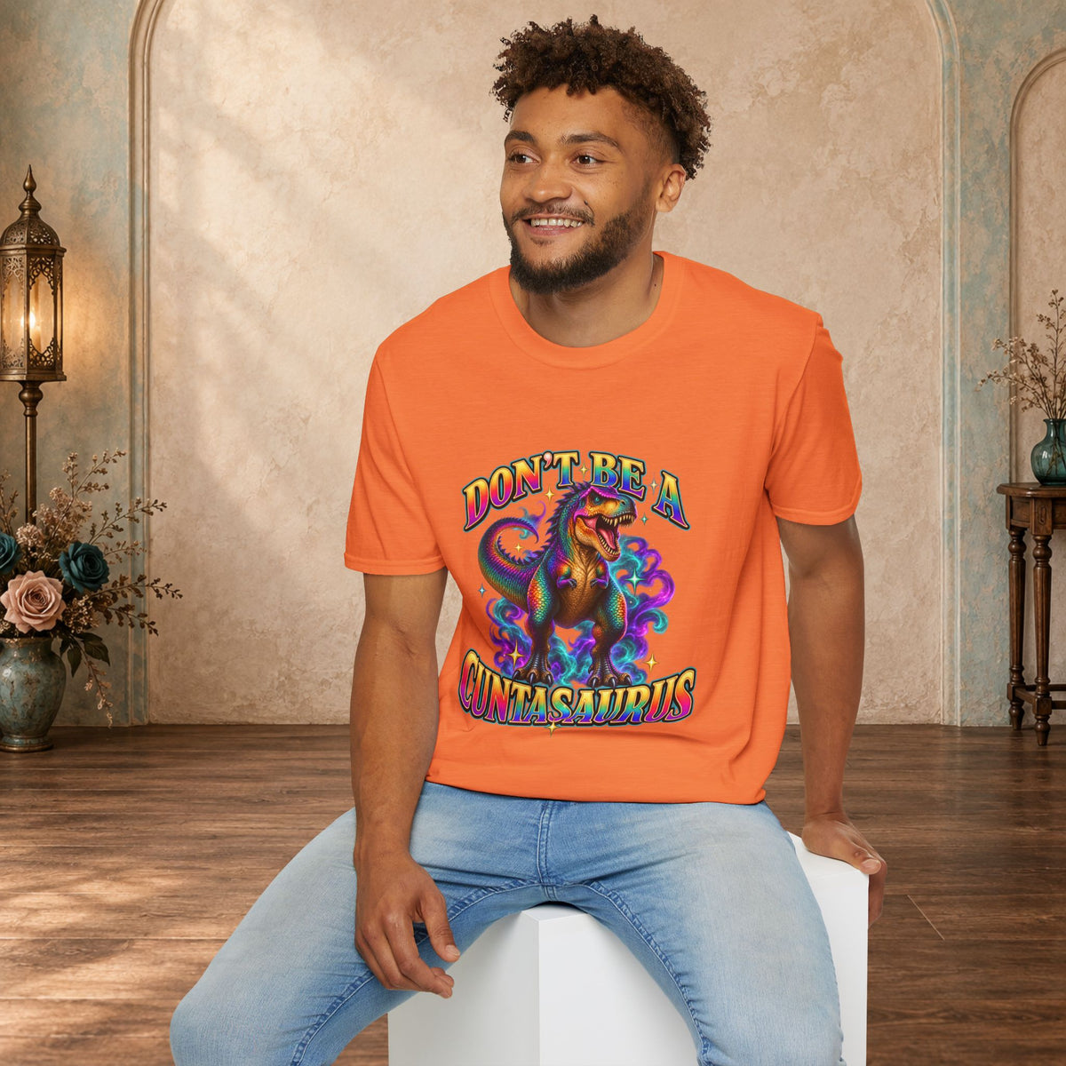 Man wearing a heather orange Don’t Be a Cuntasaurus adult humor T-shirt