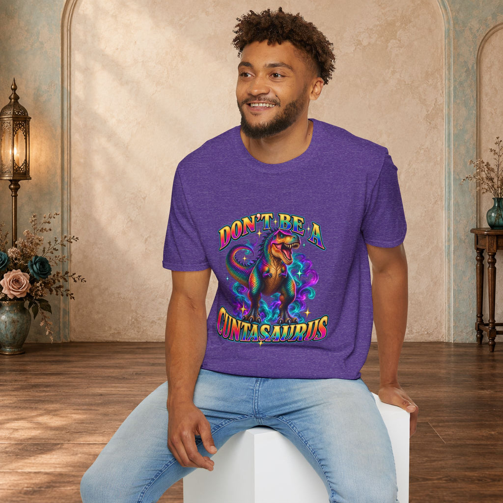 Man wearing a heather purple Don’t Be a Cuntasaurus colorful graphic T-shirt