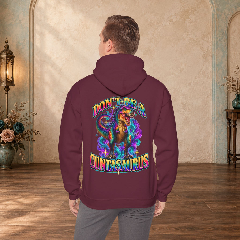Man wearing a maroon Don’t Be a Cuntasaurus funny dinosaur sweatshirt shown from the back