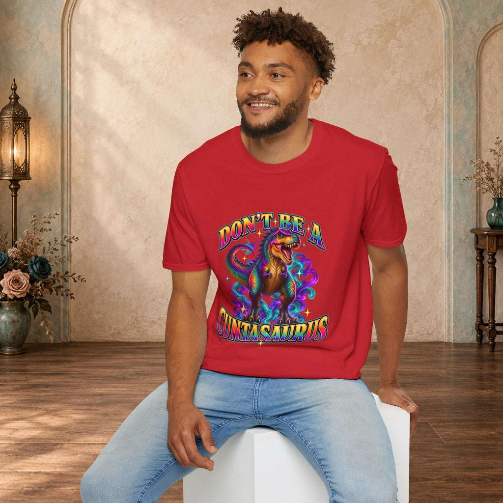 Man wearing a red Don’t Be a Cuntasaurus adult humor graphic tee
