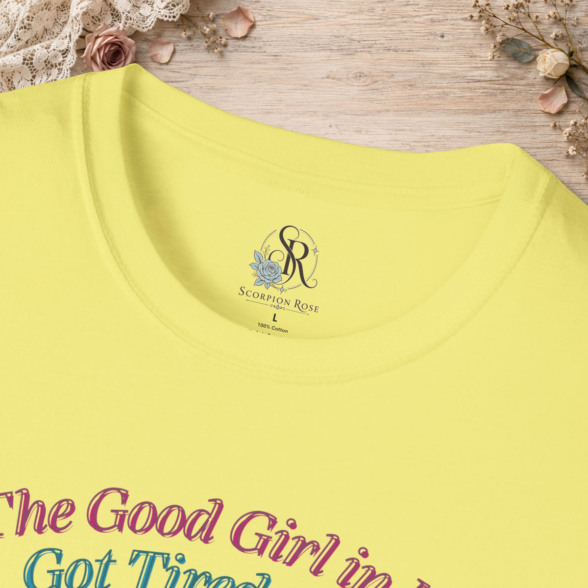 Close-up of the Cornsilk Good Girl in Me T-shirt neckline and graphic