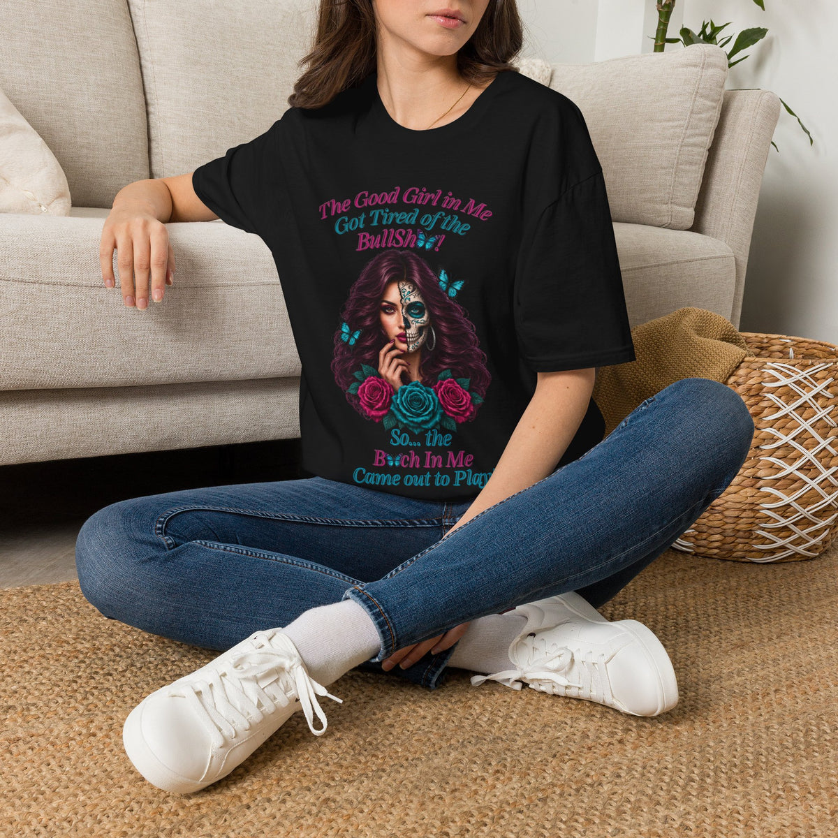 Woman wearing a Black Good Girl in Me sarcastic sugar-skull graphic T-shirt