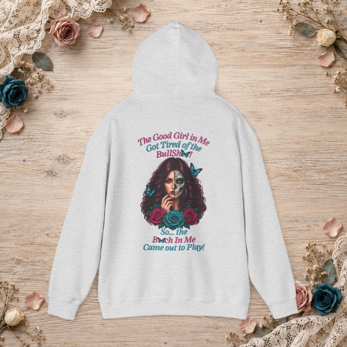 Back of ash hoodie featuring the Good Girl sugar skull woman, roses, butterflies and statement quote