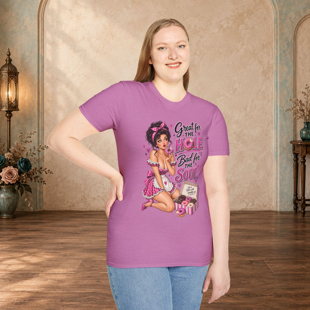 Female model wearing the Great for the Hole Bad for the Soul Pink pin-up T-shirt on heather radiant orchid. 