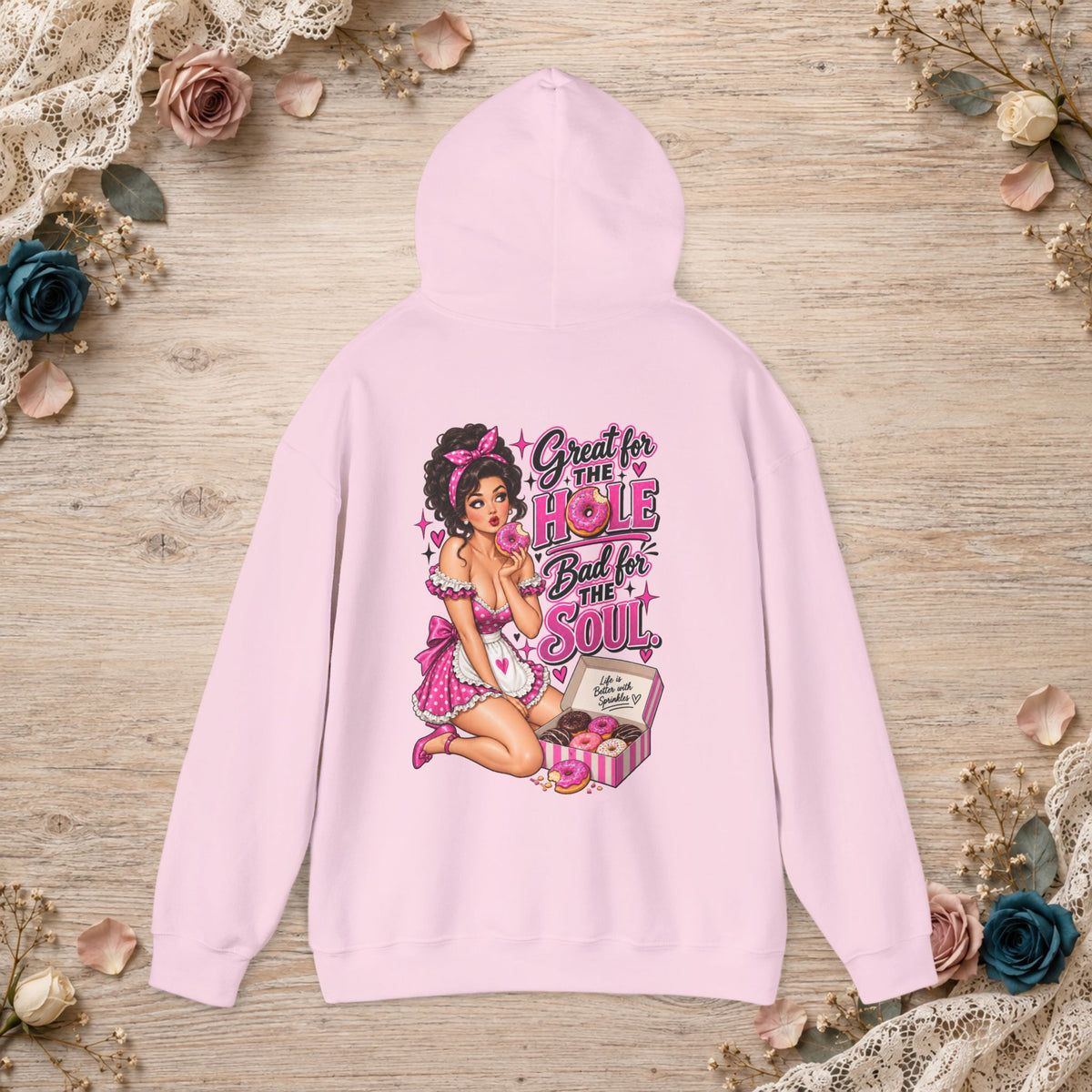 Back of light pink hoodie featuring the pink Great for the Hole, Bad for the Soul vintage pin-up design