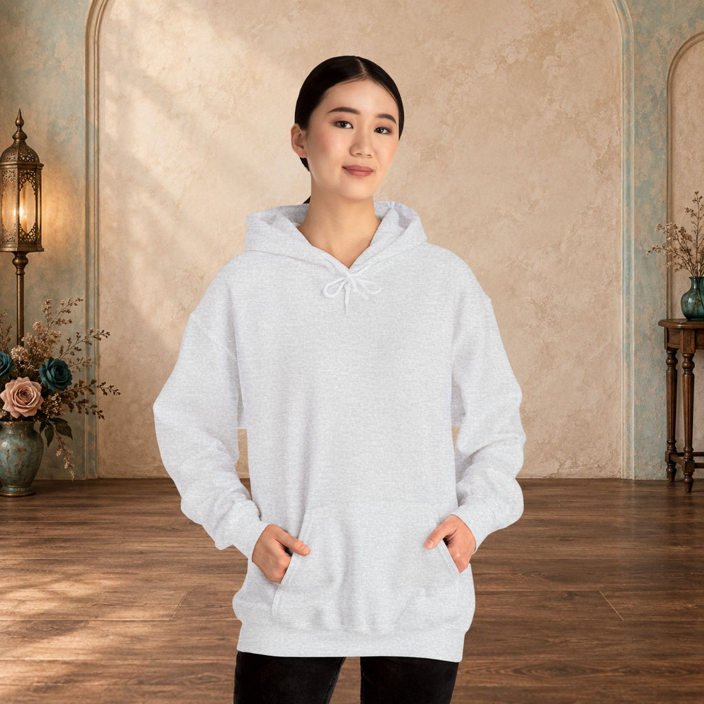 Female model wearing the blank front of an Ash I Give Awesome Headaches unisex hoodie