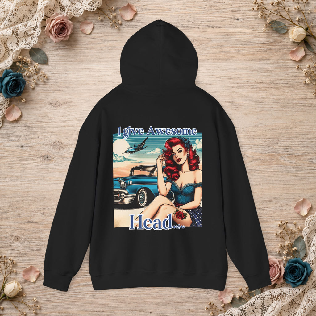 Black unisex hoodie shown flat with I Give Awesome Headaches retro pin-up artwork on the back