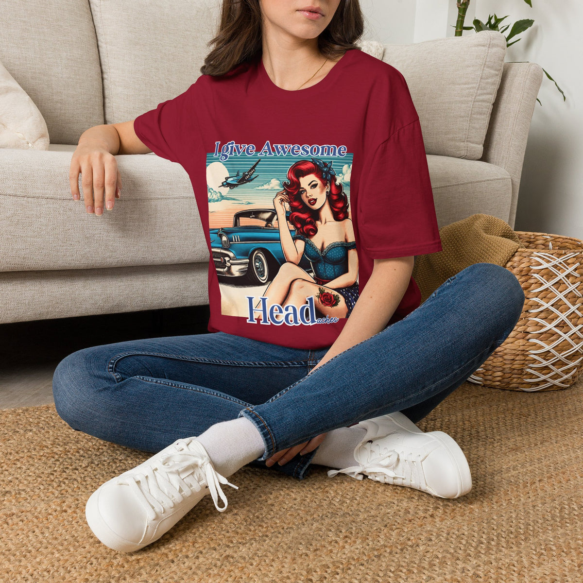 Woman wearing a Cardinal Red I Give Awesome Headaches adult-humor T-shirt