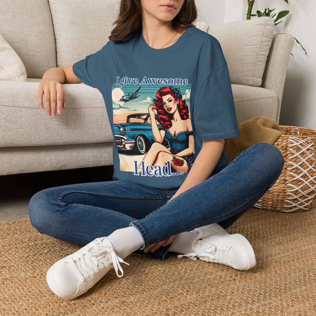 Woman wearing an Indigo Blue I Give Awesome Headaches pin-up graphic tee