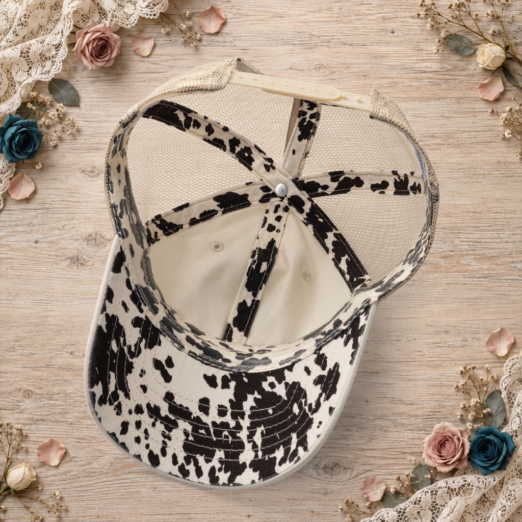 Back view of the vanilla hat featuring black-and-khaki longhorn-print mesh.
