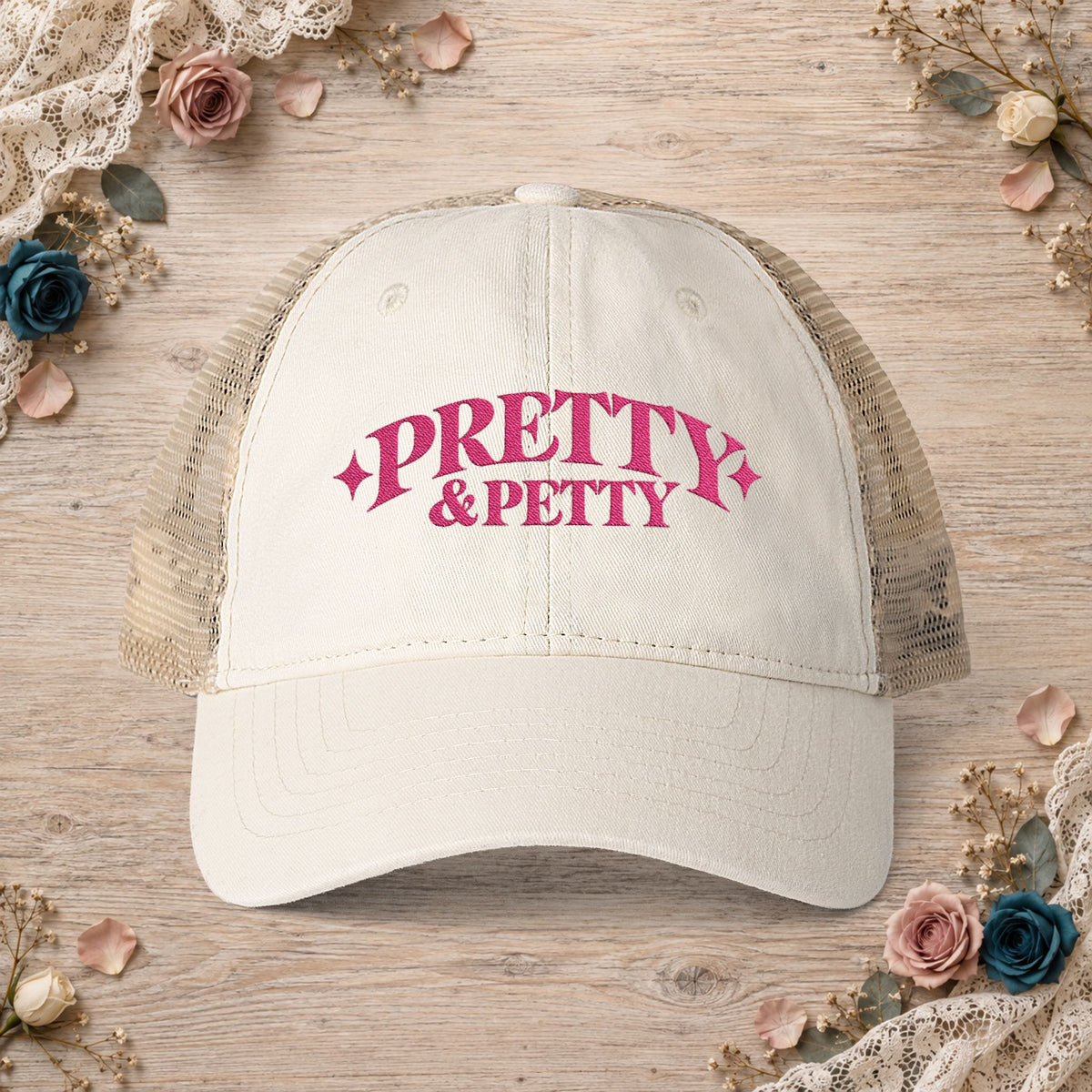 Vanilla Pretty and Petty embroidered ponytail trucker hat front view