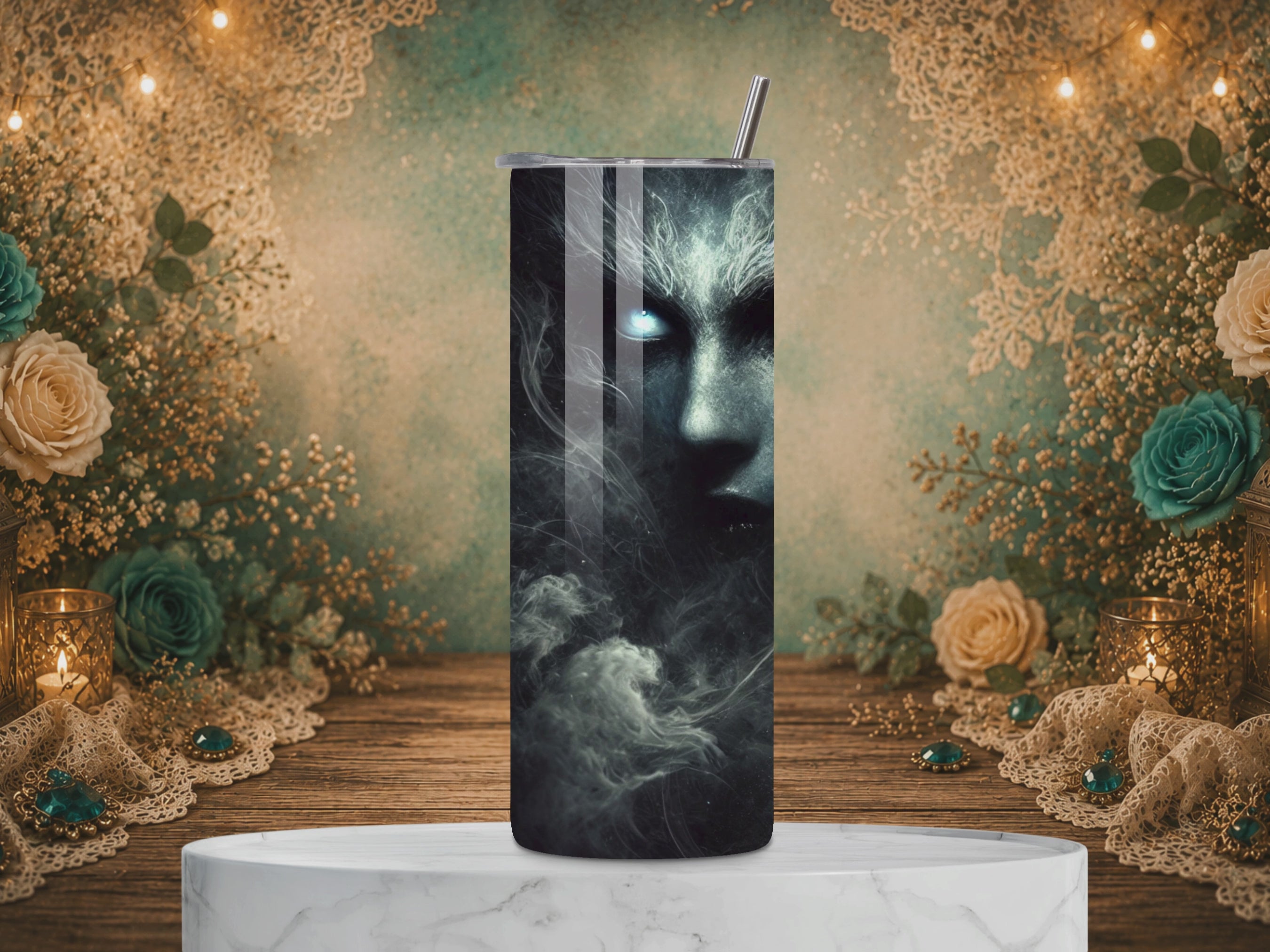 video of the Shadow Veil 20 oz stainless steel tumbler featuring an eerie shadowed face with glowing blue eyes, ghostly mist, and a dark hooded figure.
