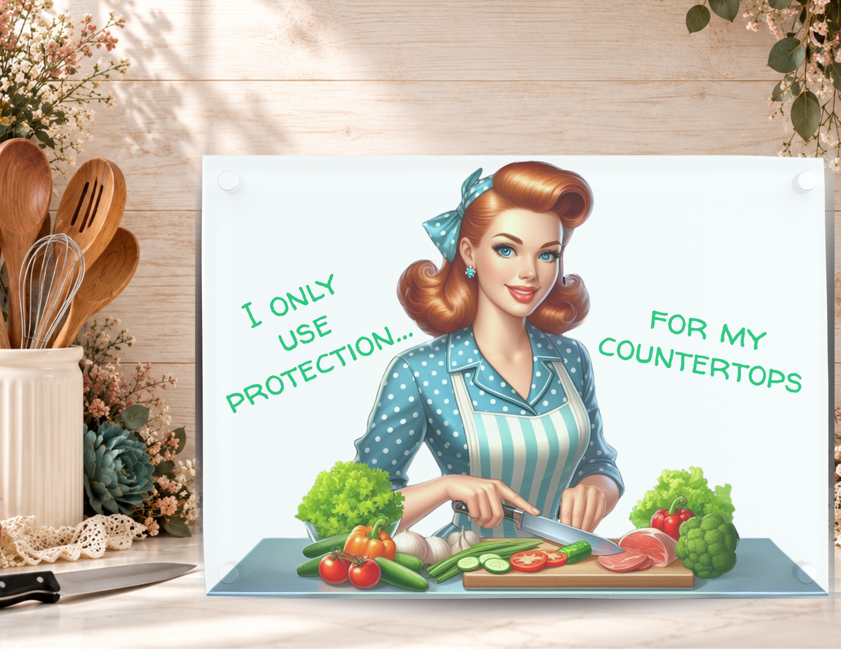 I Only Use Protection for My Countertops tempered glass cutting board displayed with kitchen utensils and floral accents