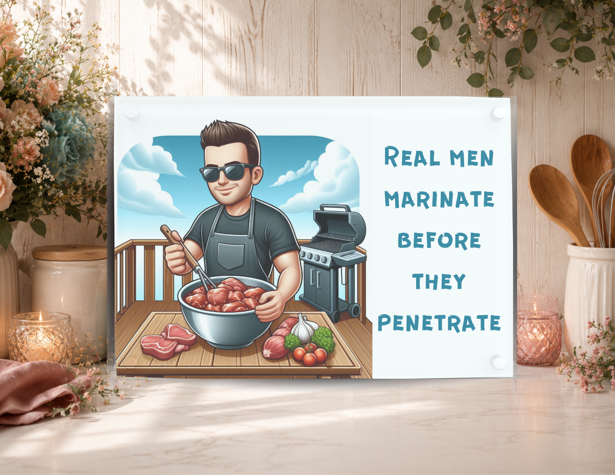 Real Men Marinate Before They Penetrate funny glass cutting board featuring a man preparing meat beside an outdoor grill