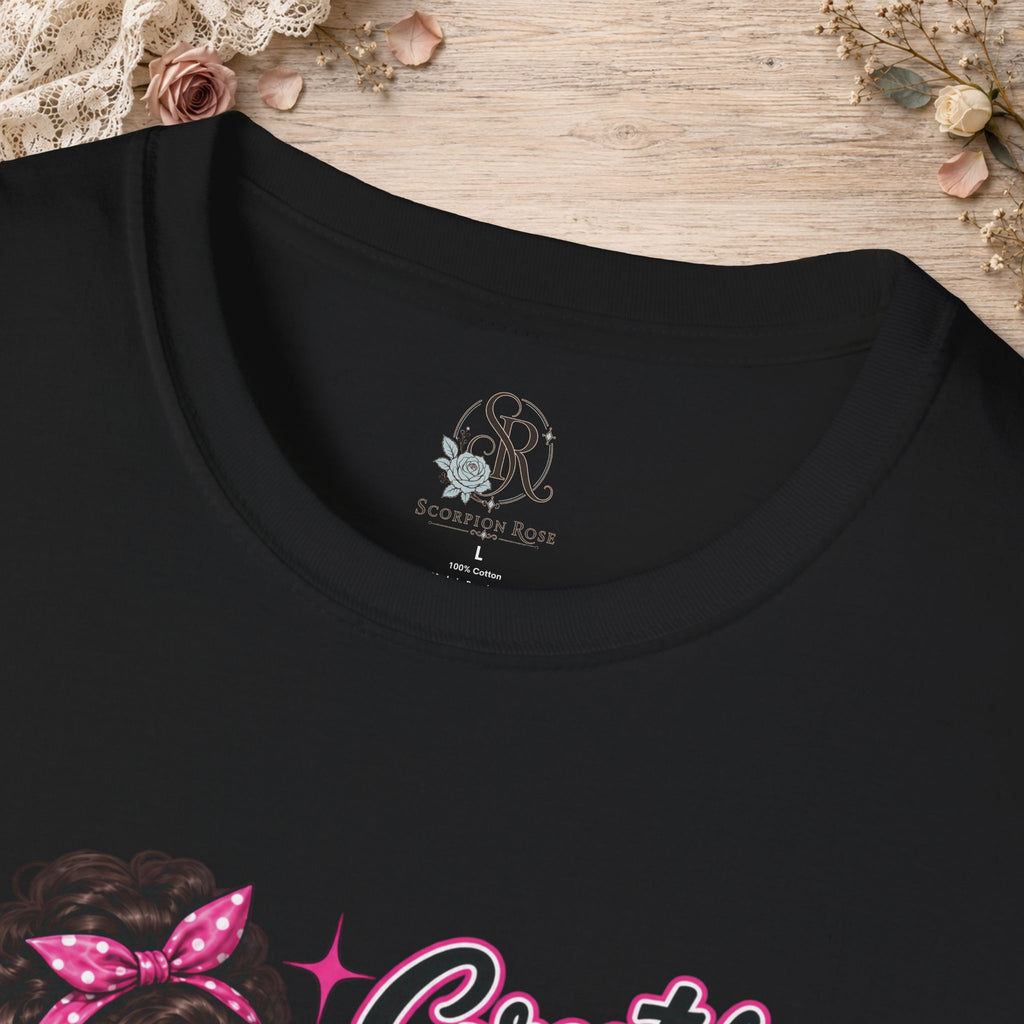 Close-up of the black T-shirt neckline showing the printed Scorpion Rose Designs inner neck label.