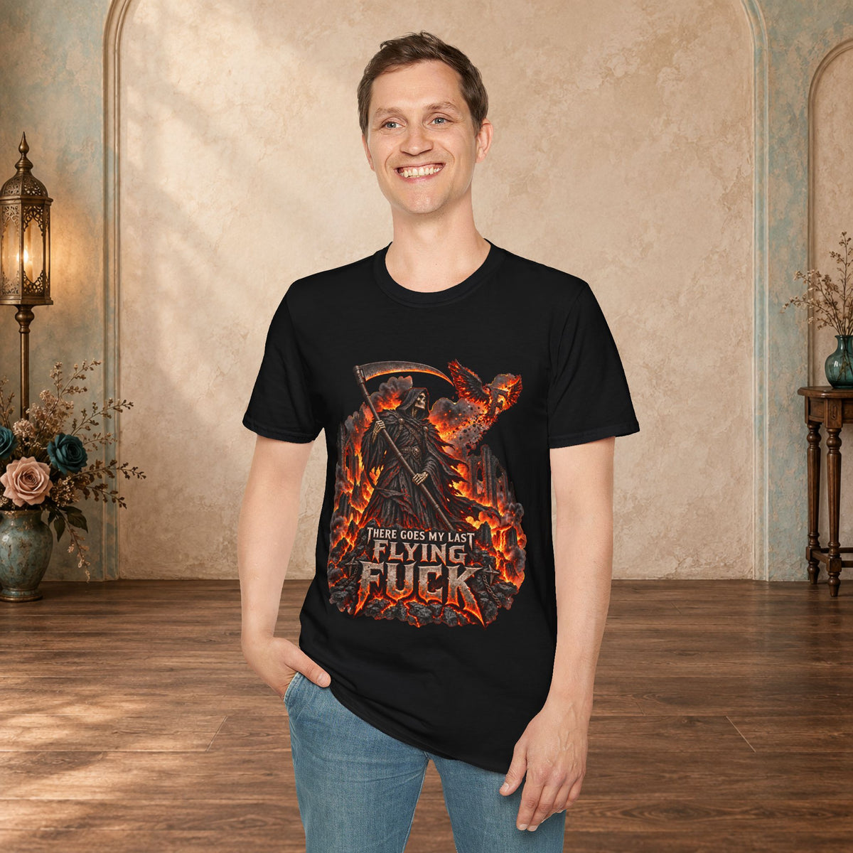 Man wearing a Black There Goes My Last Flying Fuck Grim Reaper graphic T-shirt