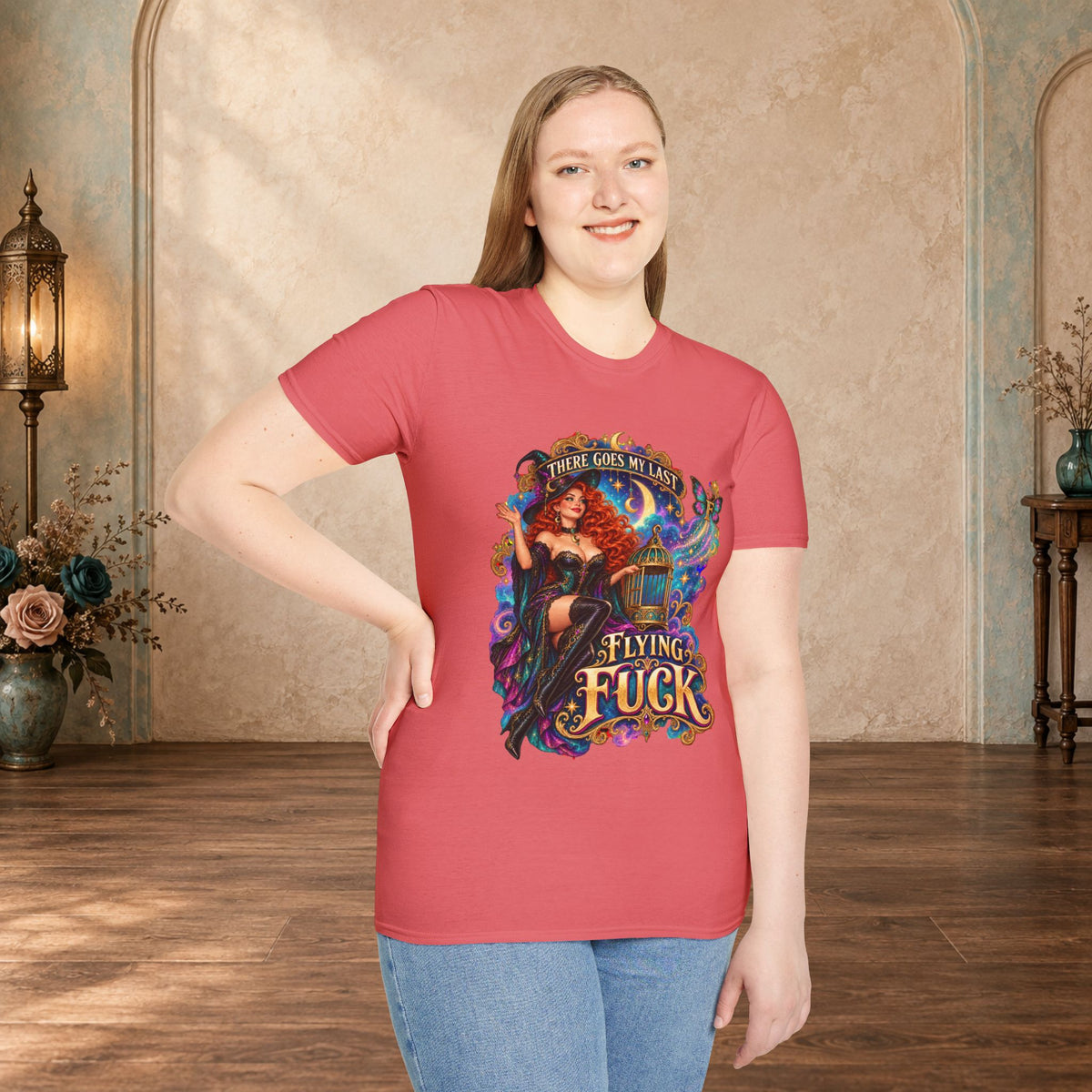 Woman wearing a Coral Silk There Goes My Last Flying Fuck witch graphic T-shirt