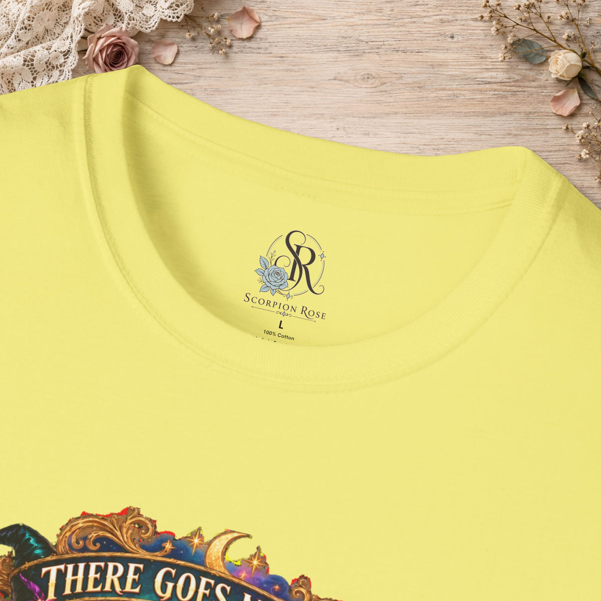 Collar and print detail of the Cornsilk There Goes My Last Flying Fuck witch T-shirt