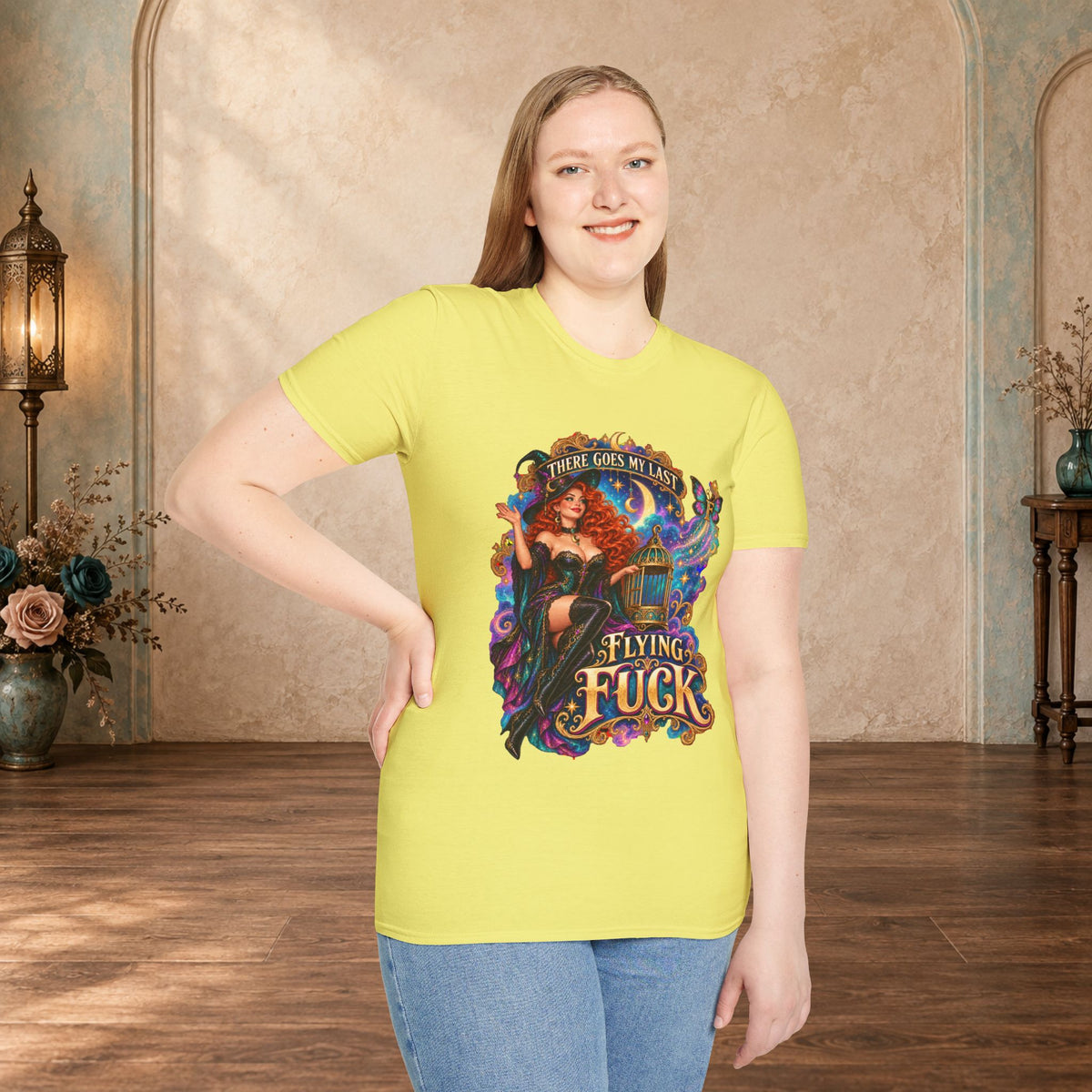 Woman wearing a Cornsilk There Goes My Last Flying Fuck witch graphic T-shirt