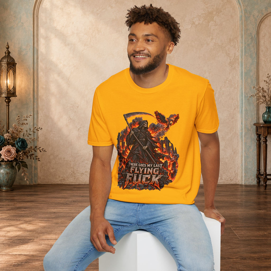 Seated man wearing a Gold There Goes My Last Flying Fuck Grim Reaper graphic T-shirt