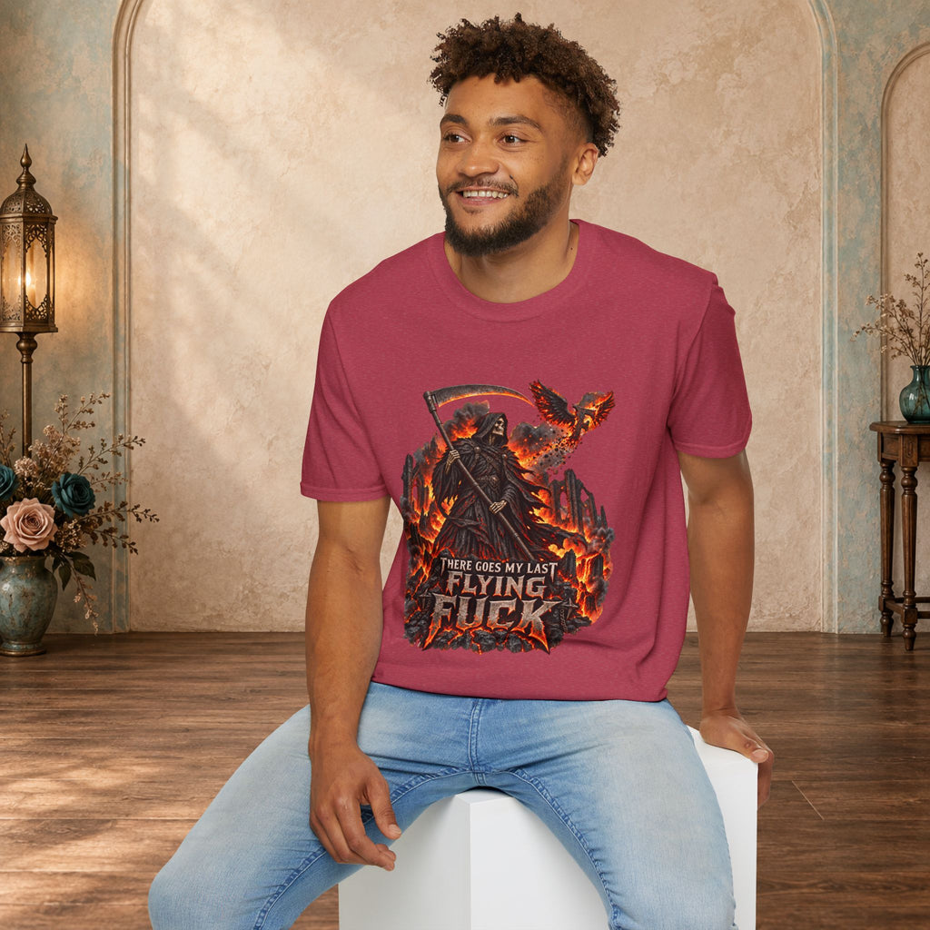 Seated man wearing a Heather Cardinal There Goes My Last Flying Fuck Grim Reaper graphic T-shirt
