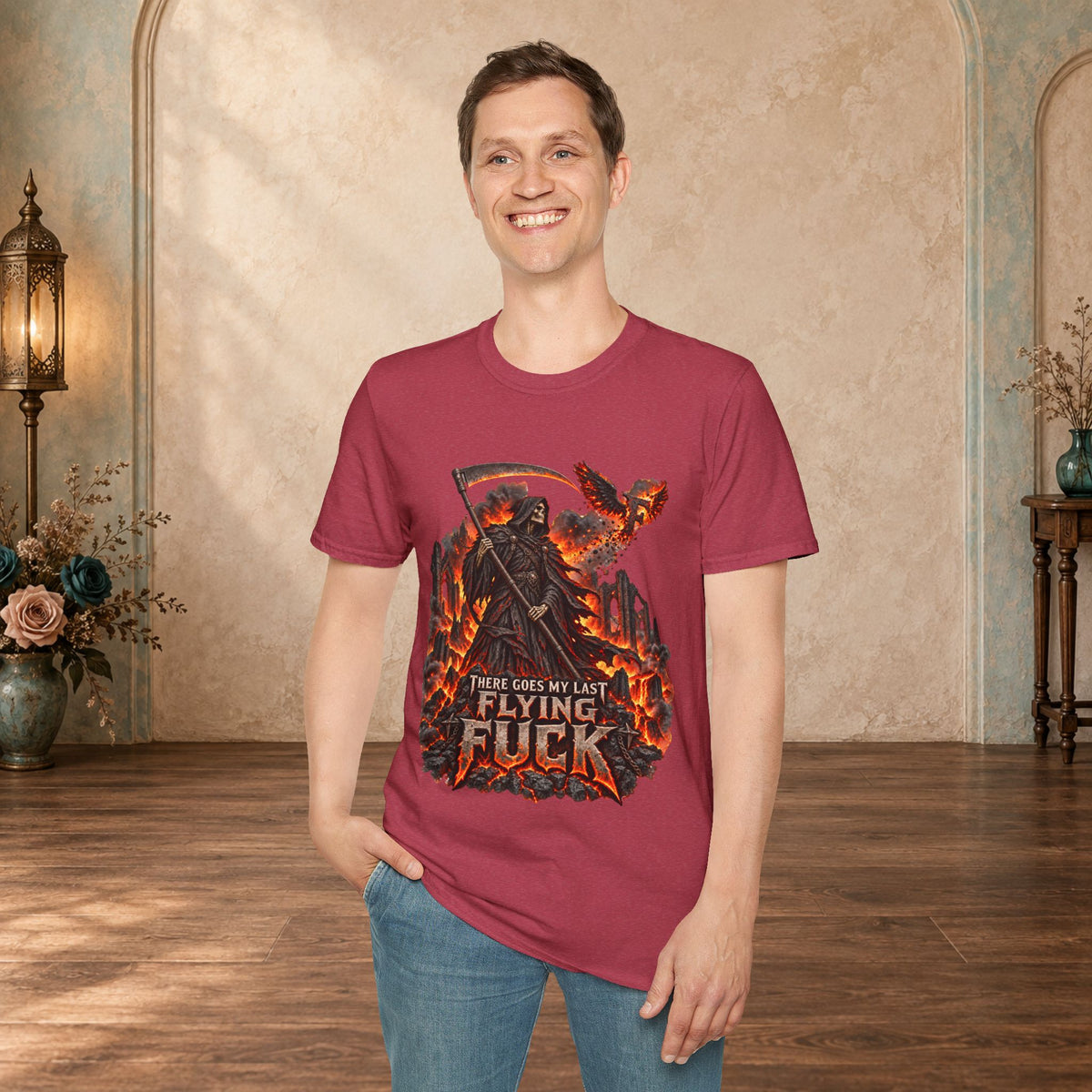 man wearing a Heather Cardinal There Goes My Last Flying Fuck Grim Reaper graphic T-shirt