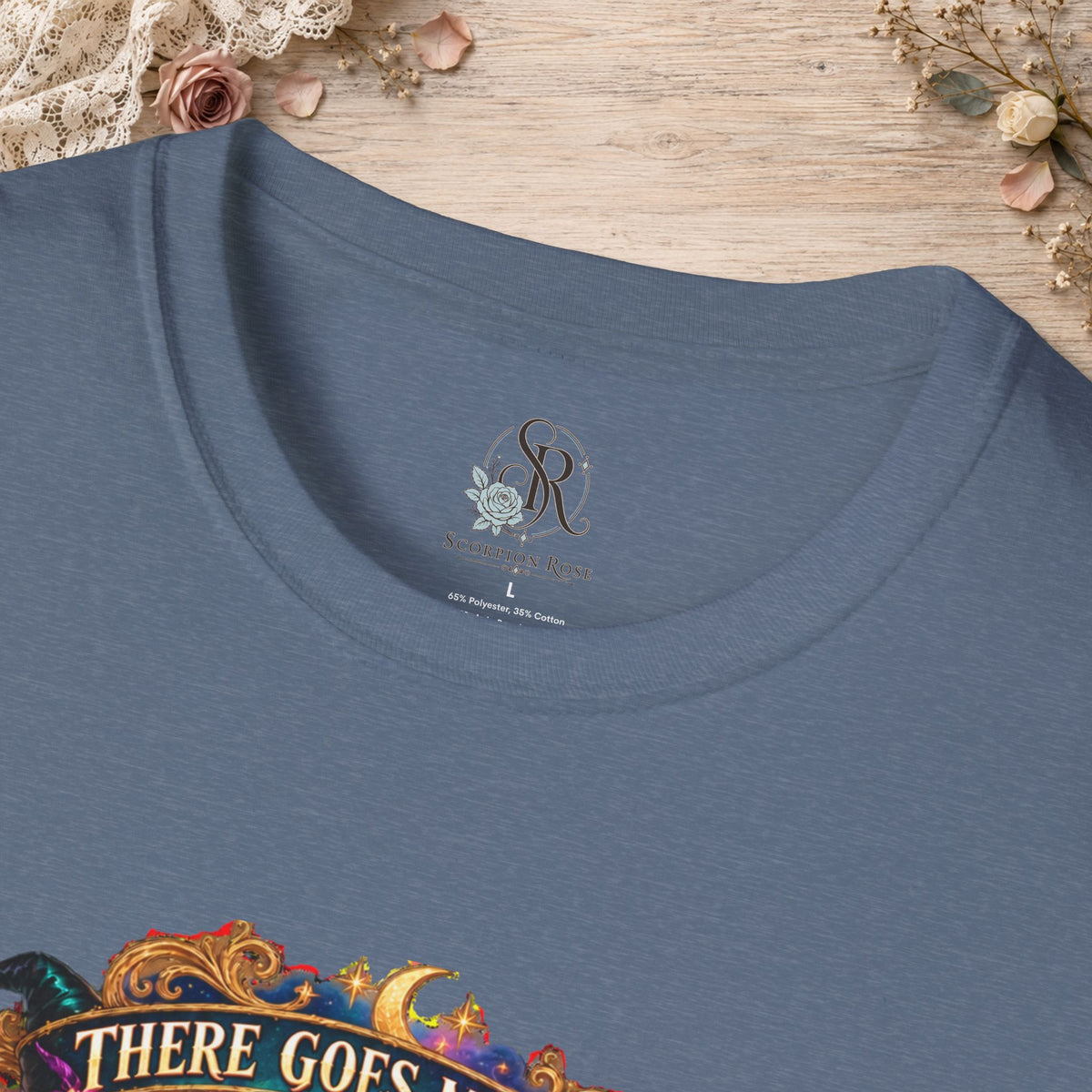 Collar and print detail of the Heather Indigo There Goes My Last Flying Fuck witch T-shirt