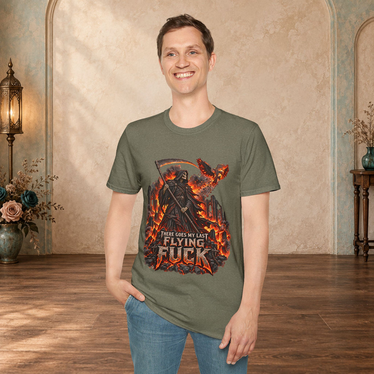 Man wearing a Heather Military Green There Goes My Last Flying Fuck Grim Reaper graphic T-shirt