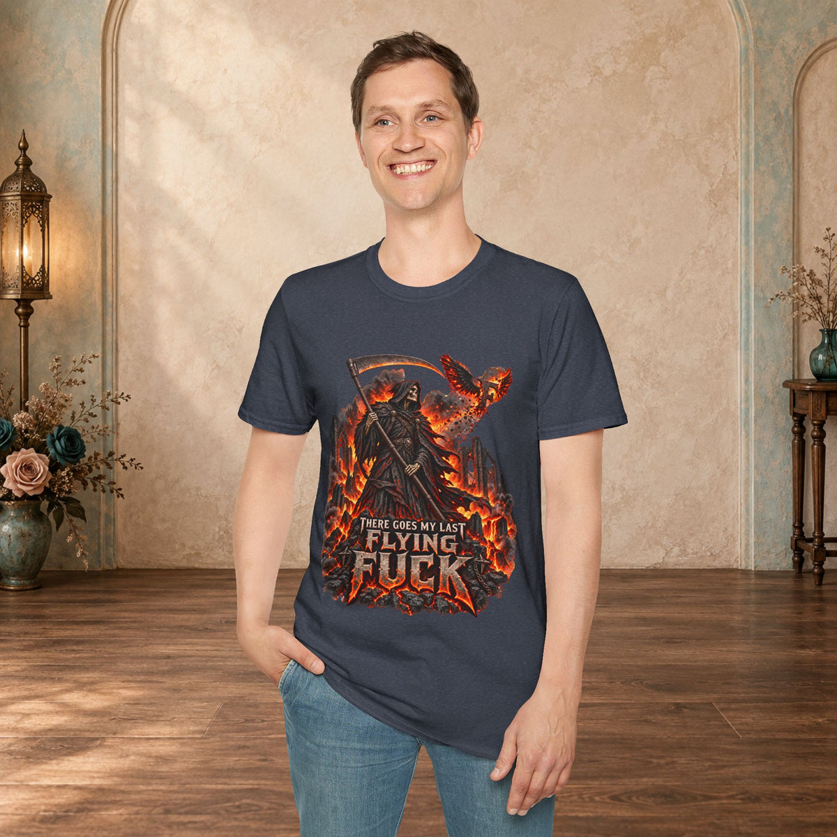 man wearing a Heather Navy There Goes My Last Flying Fuck Grim Reaper graphic T-shirt